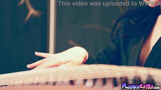 Wu Muxi's natural Chinese tits and hairy Asian pussy get a sensual tease in solo play