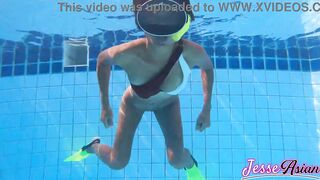 Petite Asian girl with short hair enjoys ass to mouth and anal play in the pool - 7 image