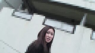 Naughty Japanese MILF Nagisa Fukushima rubs her hot body against a stranger's fire